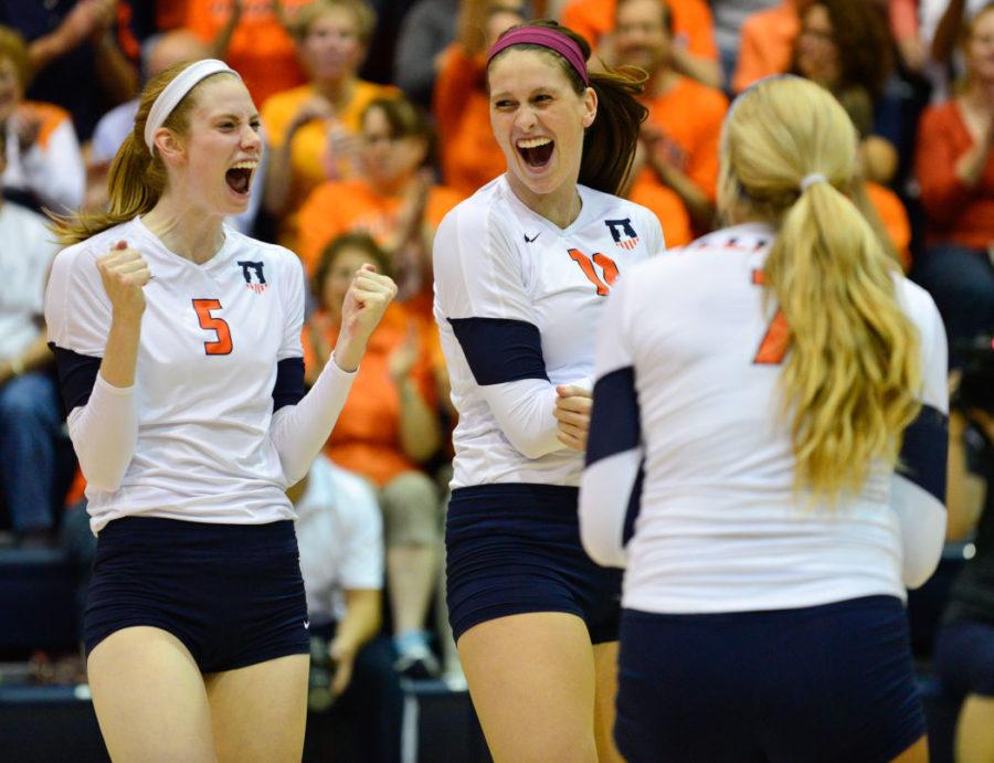 Illinois Liz McMahon (14) celebrates with her teammates during the game against Minnesota at Huff Hall, on Wednesday, Oct. 1, 2014. The Illini won 3-0.