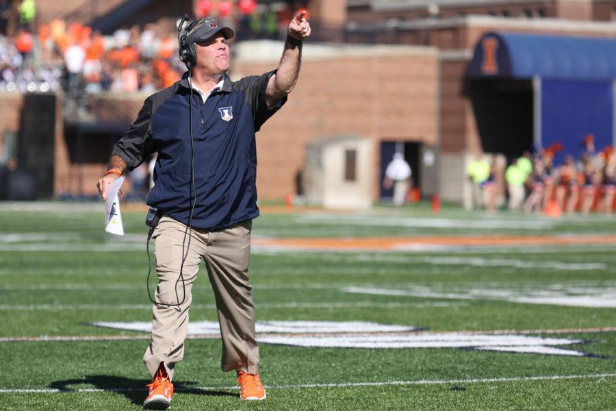 Illinois' head coach Tim Beckman reacts to a referee's call during the homecoming game against Minnesota at Memorial Stadium on Saturday, Oct. 25, 2014. The Illini won 28-24.