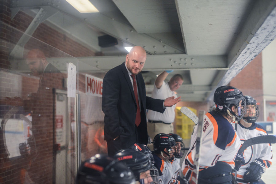 Illinois+hockey+head+coach%2C+Nick+Fabrini%2C+speaks+to+the+team+during+the+game+against+Michigan+State+on+Saturday%2C+September+27th%2C+2014.