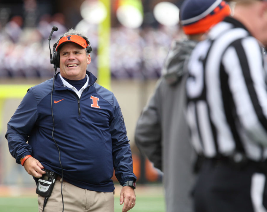 Illinois Tim Beckman reacts during the reviewing of a play during the game against Purdue at Memorial Stadium on Saturday Oct. 4, 2014. Beckman will return to coach the Illini in 2015.