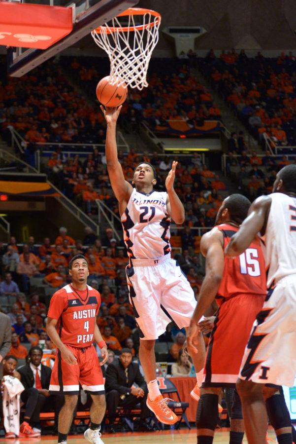 Illinois Malcolm Hill (21) attempts a lay up during the game against Austin Peay at State Farm Center on Friday, Nov. 21, 2014. The Illini won 107-66.