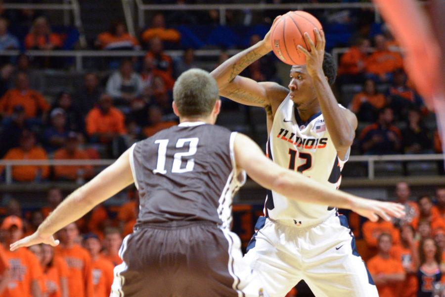 Illinois Leron Black looks for an open pass during the exhibition game against Quincy at State Farm Center on Friday. The Illini won 91-62. Black scored 15 points and grabbed eight rebounds. 