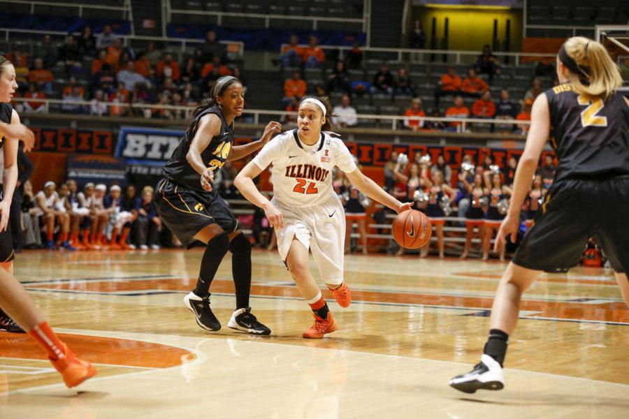 Illinois Ivory Crawford (22) drives the ball during the game against Iowa at State Farm Center on Sunday, March 2, 2014.
