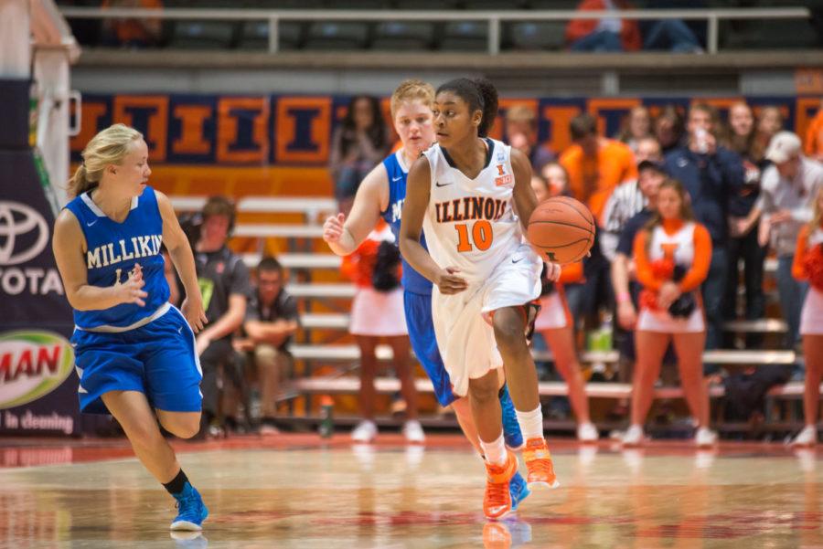 Illinois Amarah Coleman dribbles down the court during the exhibition game against Millikin at the State Farm Center on Nov. 8. The Illini won 108-38.