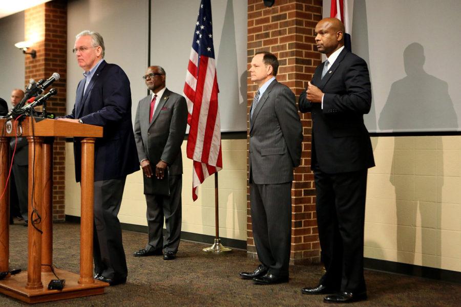 Missouri Gov. Jay Nixon, St. Louis County Executive Charlie Dooley, St. Louis Mayor Francis Slay and Public Safety Director Dan Isom call for peace in anticipation of the announcement of the grand jury decision in the Darren Wilson case on Monday, Nov. 24, 2014, at the University of Missouri-St. Louis. (Huy Mach/St. Louis Post-Dispatch/TNS)