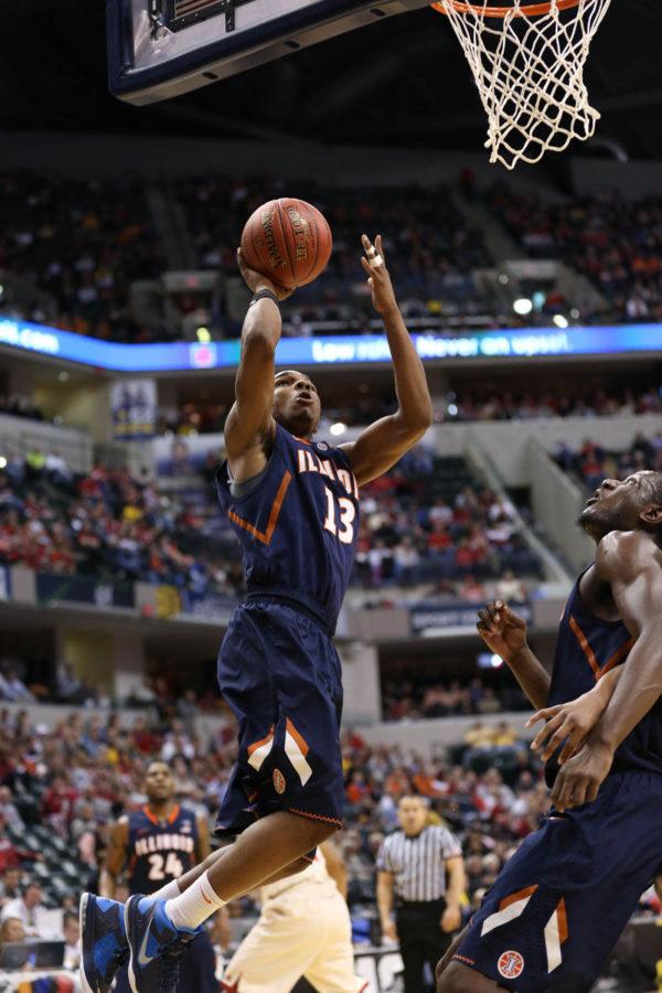 Illinois Tracy Abrams (13) attempts a layup during the first round game of the Big Ten Mens Basketball Tournament against Indiana at Bankers Life Fieldhouse, on Thursday, Mar. 13, 2014 The Illini won 64-54.