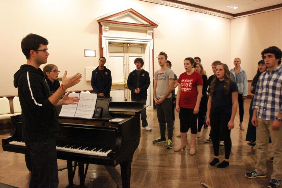 Brian Smith, vocal director for West Side Story conducts vocal warmups during rehearsal on Nov. 3.