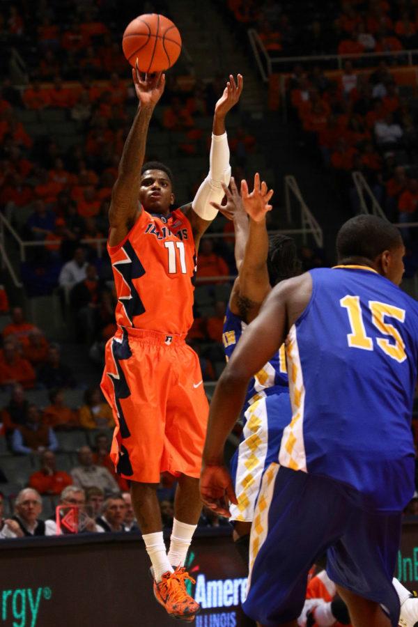 Illinois Aaron Cosby (11) takes a shot during the game against Coppin State at State Farm Center, on Sunday, Nov. 16, 2014. The Illini won 114 to 56.