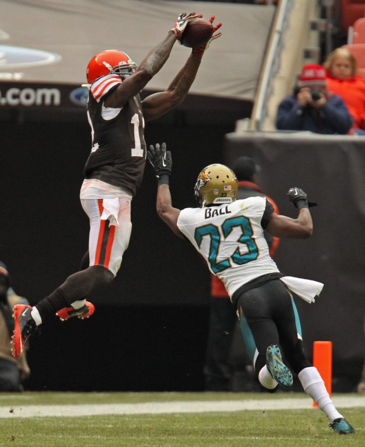 Cleveland wide receiver Josh Gordon, left, leaps over Jacksonville cornerback Alan Ball to grab a pass in the Browns Dec. 1, 2013, game against the Jaguars in Cleveland, Ohio. (Ed Suba Jr./Akron Beacon Journal/MCT)