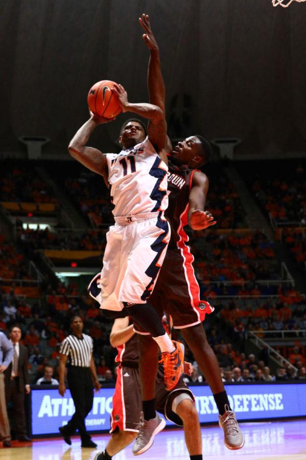 Illinois' Aaron Cosby (11) attempts a contested layup during the game against Brown at State Farm Center, on Nov. 24, 2014. The Illini won 89-68.