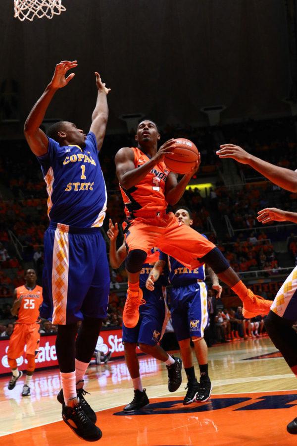 Illinois Ahmad Starks (3) attempts a contested layup during the game against Coppin State at State Farm Center, on Sunday, Nov. 16, 2014. The Illini won 114 to 56.