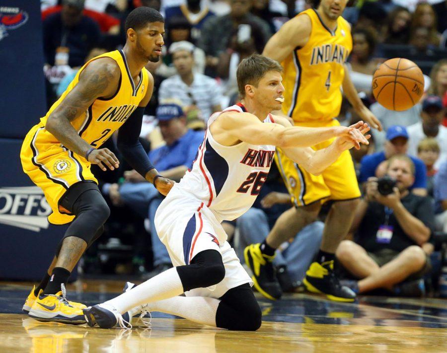 Curtis Compton Tribune news service The Atlanta Hawks Kyle Korver gets off a pass under pressure from the Indiana Pacers Paul George, left, during the first half of Game 4 of an NBA Eastern Conference quarterfinal at Philips Arena in Atlanta, Saturday, April 26, 2014. Indiana won, 91-88, to tie the series. (Curtis Compton/Atlanta Journal-Constitution/MCT)