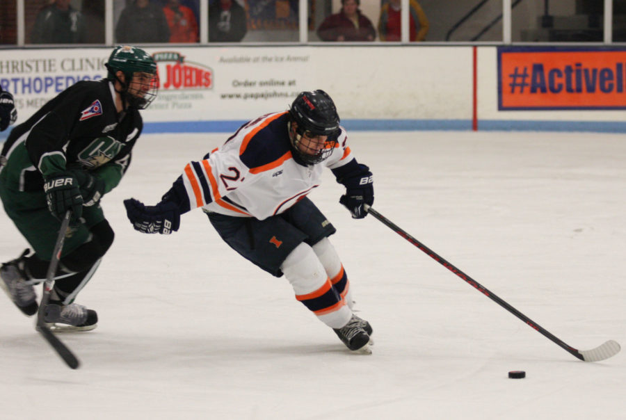 Illinois' Kyle Varzino (27) tries to keep the puck away from Ohio during the Ohio hockey game at the Ice Arena on Oct. 24. The Illini had a pair of matches this weekend against Aurora.