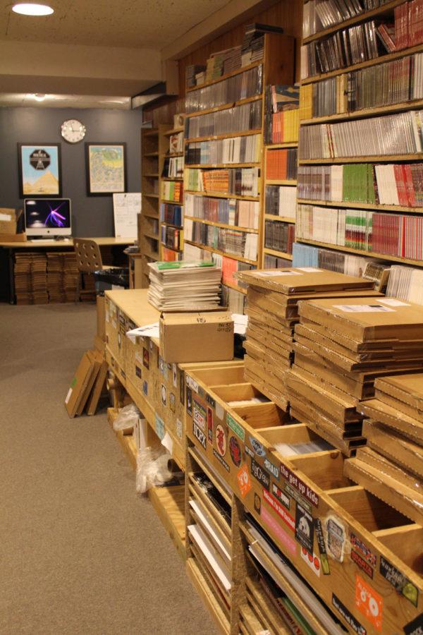 Vinyl records stack the shelves of Polyvinyl Record Co.s offices in downtown Champaign.
