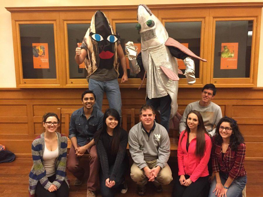 Students in an ENG 315 Learning in Community (LINC) class pose with fish costumes to advertise for the Medicine Take-back Event on Thursday at the Illini Union.