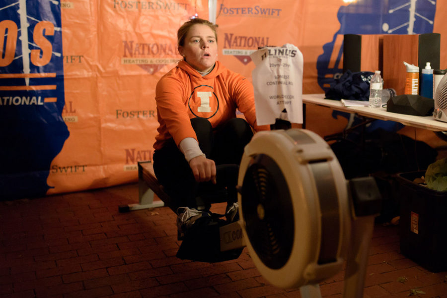 Elizabeth Dunne, senior in Media and member of the rowing team, attempts to break records for continuous rowing at the anniversary plaza on Sunday.