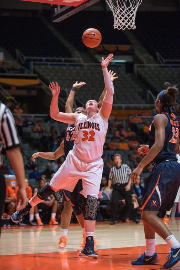 Illinois’ Chatrice White attempts a contested layup during the game against Virginia on Wednesday.
