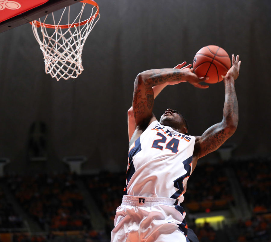 Illinois Rayvonte Rice (24) draws contact while attempting a shot during the game against Kennesaw State at State Farm Center on Dec. 27, 2014. The Illini won 93-45.