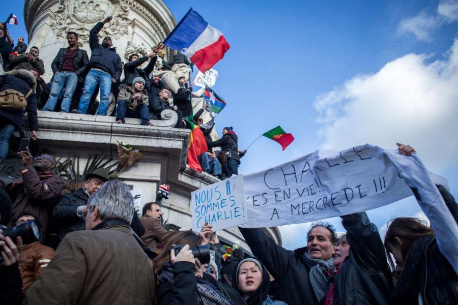 People gather in Paris during a unity rally on Sunday, Jan. 11, 2015, in tribute to the 17 victims of a three-day killing spree by homegrown Islamists. (Michael Bunel/NurPhoto/Zuma Press/TNS)