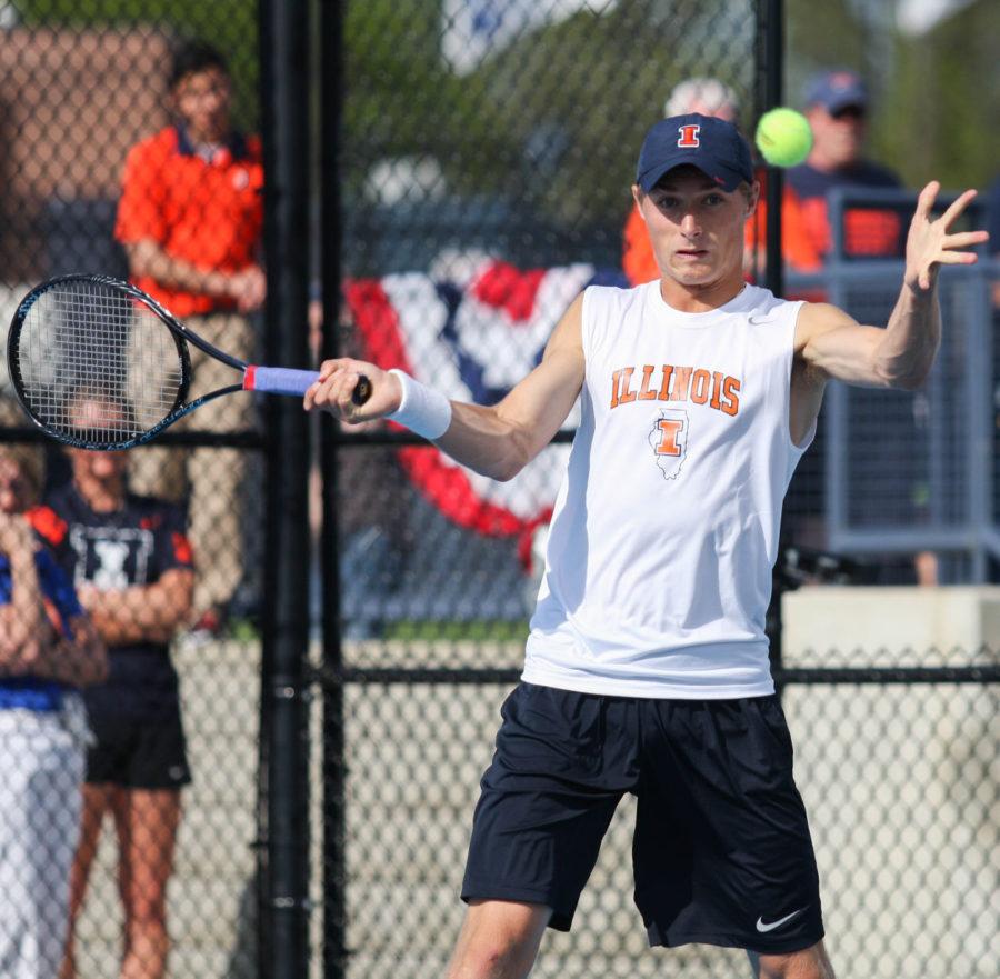 Illinois+Tim+Kopinski+prepares+to+hit+the+ball+back+during+the+first+round+of+NCAA+Tennis+Regionals+against+Ball+State+University+at+Khan+Outdoor+Tennis+Complex+on+Friday%2C+May+9%2C+2014.+The+Illini+won+4-0.