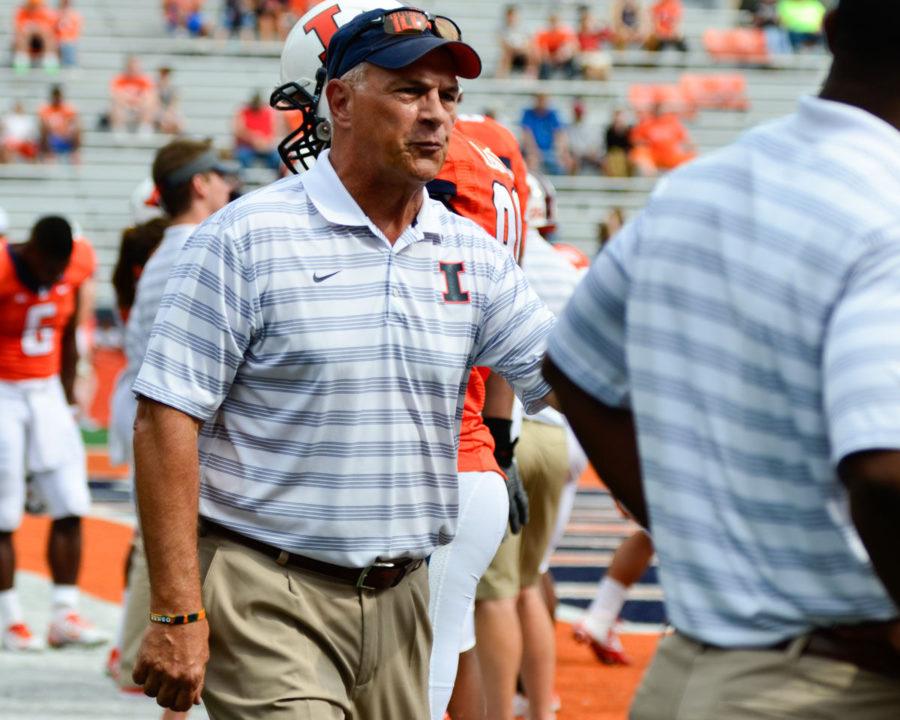 Illinois defensive coach Greg Colby before the game against Texas State at Memorial Stadium on Sept. 20. Colby and special teams coordinator Tim Salem will not return to head coach Tim Beckmans staff in 2015.