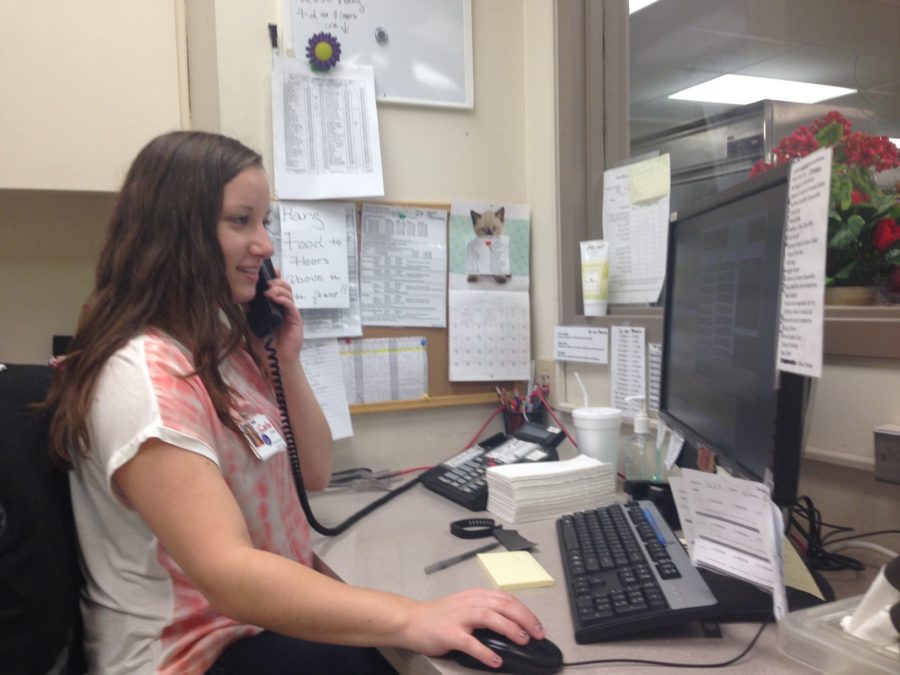 Laurel Jakubowski, senior in ACES, works at her job at Carle Foundation Hospital in Urbana, Illinois.