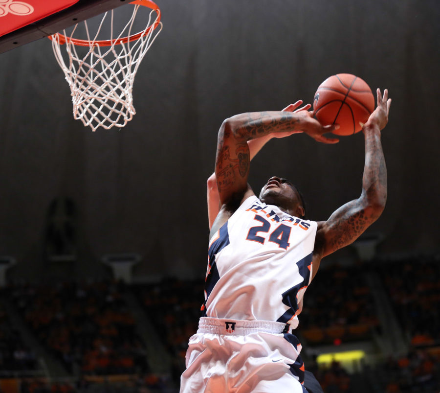 Illinois' Rayvonte Rice (24) draws contact while attempting a shot during the game against Kennesaw State at State Farm Center on Dec. 27, 2014. The Illini won 93-45.