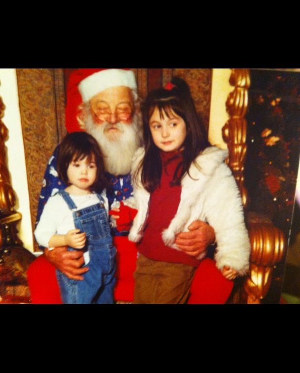 Rothman (right) and her younger sister Sydney sit on Santas lap at a mall in Northbrook, Illinois, in 2000.