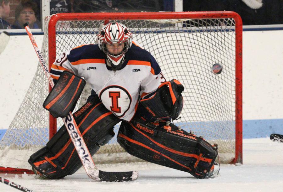 Illinois' Joe Olen (31) attempts to block a shot during the hockey game vs. Robert Morris at the Ice Arena on Saturday, Jan. 24, 2015. The Illini lost 4-3.