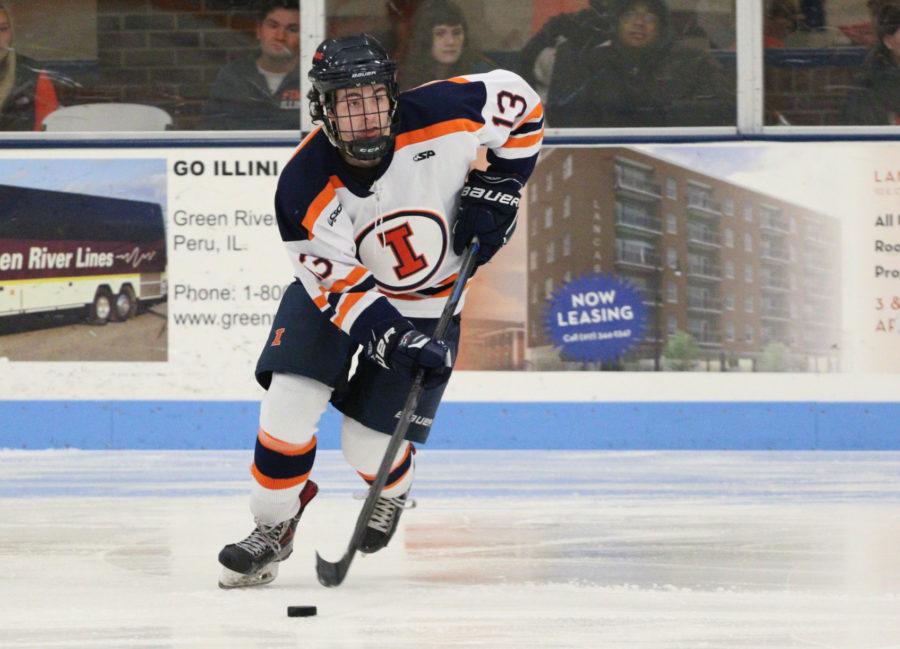 Illinois’ James McGing looks for an open pass against Robert Morris at the Ice Arena on Jan. 24. The Illini snapped a five-game losing streak this weekend against Oklahoma.