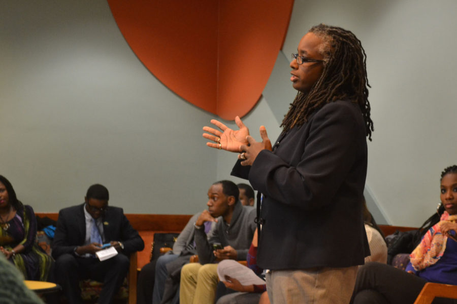 Menah Pratt-Clarke, assistant provost and associate director for the Office of Diversity, Equity, and Access, addresses students during a town hall style meeting held in the Oglesby Lounge at FAR on Tuesday. The University is working to become more inclusive.