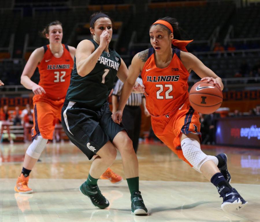 Illinois Ivory Crawford (22) drives to the basket during the game against Michigan State at State Farm Center, on Feb. 25, 2015. The Illini lost 67 to 65.