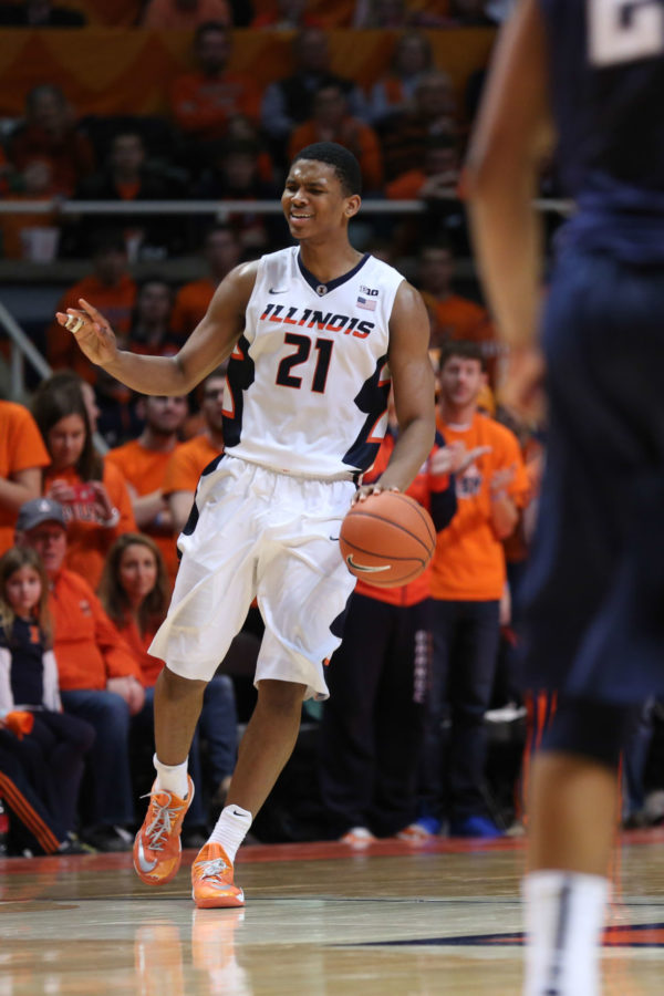 Illinois+Malcolm+Hill+signals+to+his+teammates+during+the+game+against+Penn+State+at+State+Farm+Center+on+Saturday.+The+Illini+won+60-58.