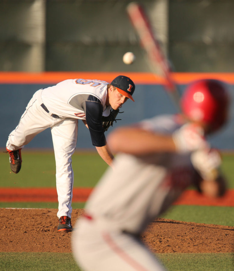 Illinois Drasen Johnson pitches the ball during the game against Indiana at Illinois Field on April 25. The Illini lost 9-3.
