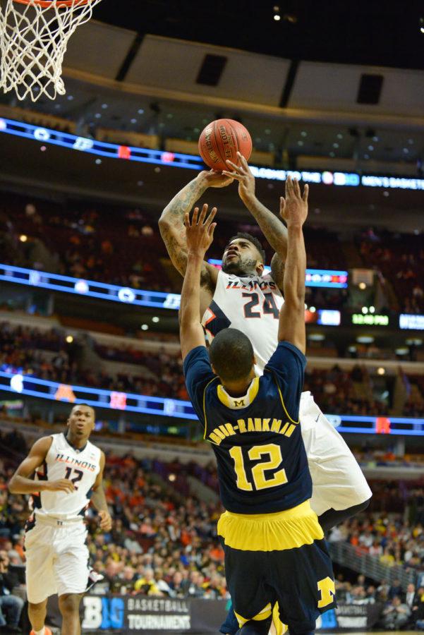 Illinois Rayvonte Rice shoots the ball during the game against Michigan at United Center in Chicago, Illinois, during the Big Ten Tournament on Thursday. The Illini lost 73-55, sending them to the National Invitational Tournament for the second year in a row.