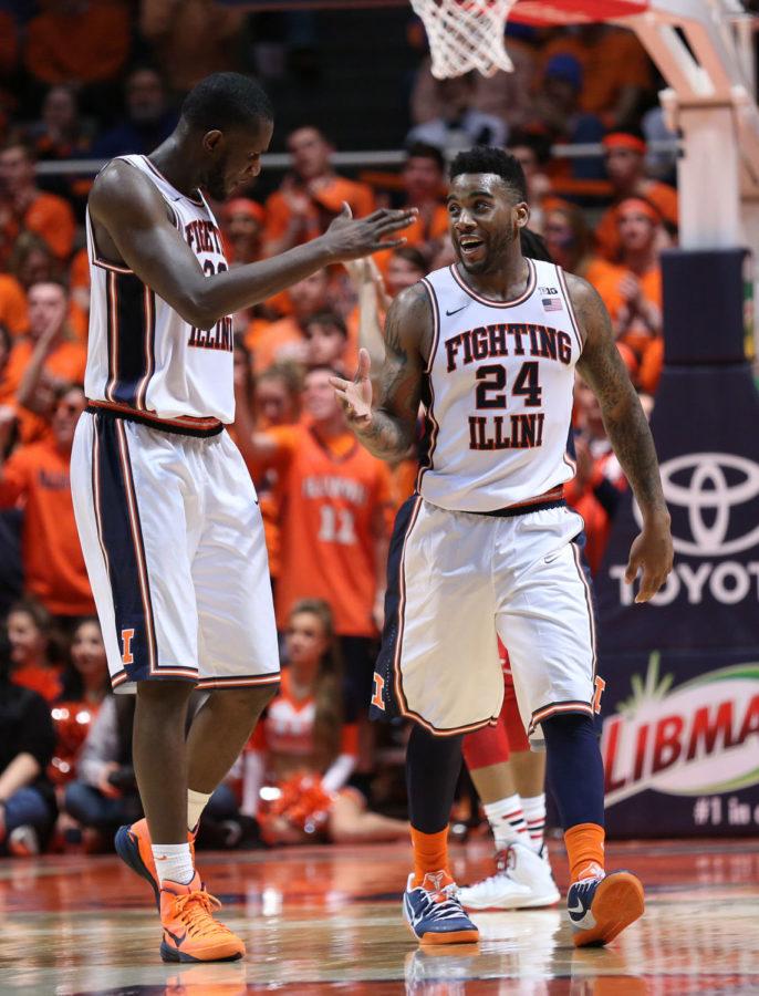 Illinois Nnanna Egwu (32) and Rayvonte Rice (24) react after a point during the game against Nebraska at State Farm Center, on Wednesday, March 5, 2015. The Illini won 69-57.