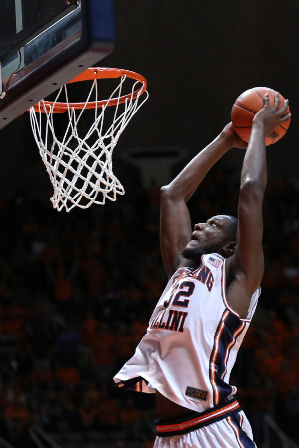 Illinois Nnanna Egwu (32) rises for a two-handed dunk during the game against Nebraska at State Farm Center, on Wednesday, March 5, 2015. The Illini won 69-57.