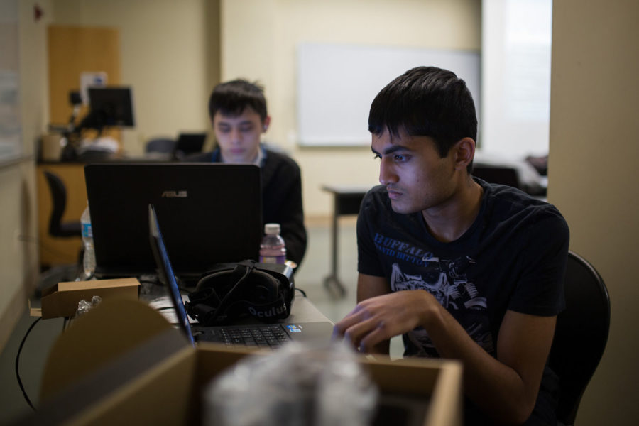 Bharath Kalidindi, freshman from Georgia Tech, programs at Hack Illinois 2015 on Saturday, Feb. 28th, 2015.
