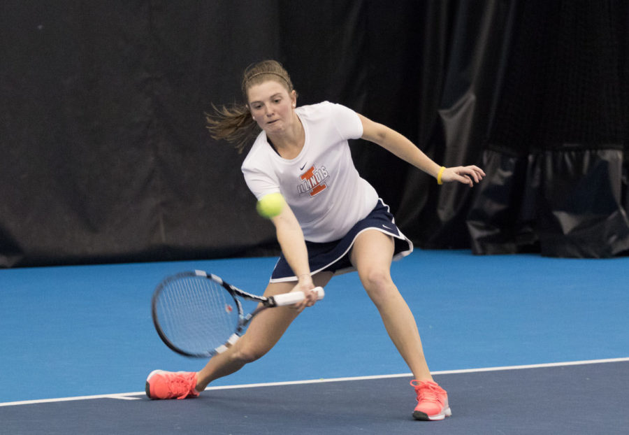 Illinois Alexis Casati reaches for a return during the tennis match v. Marquette at Atkins Tennis Center on Sunday, Feb. 15. Illinois won 5-2.