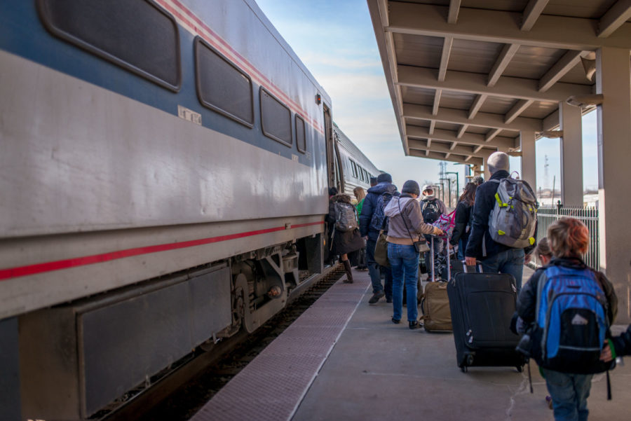 Passengers line up to board the Amtrak train at the Illinois Terminal on Tuesday, March 17, 2015.