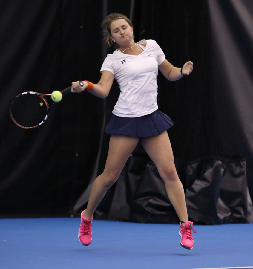 Illinois Melissa Kopinski attempts to return the ball during the match against Indiana at Atkins Tennis Center, on Sunday, March. 1, 2015. The Illini won 6-1.