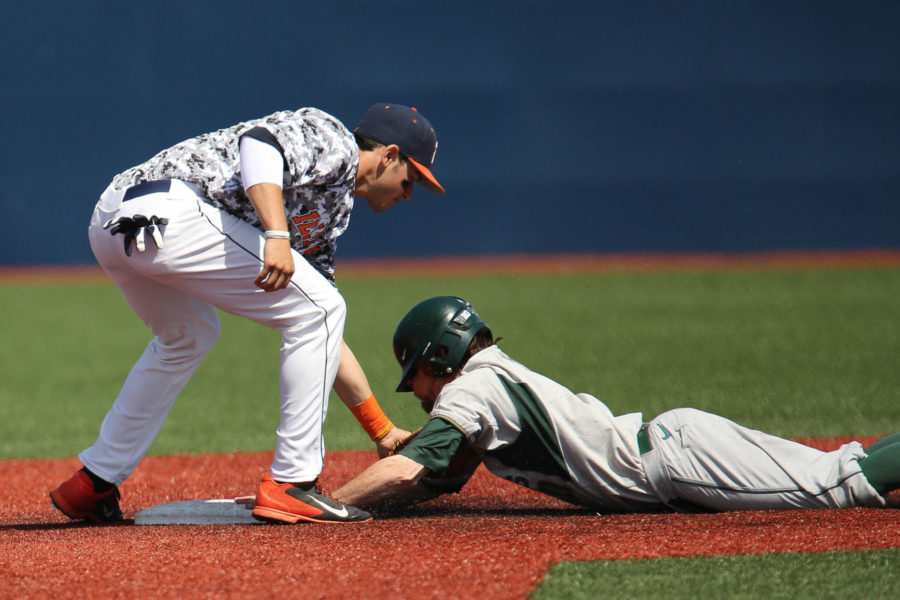 Illinois’ Adam Walton tags for an out during the game against Michigan State. Walton was instrumental in the Illini’s 6-2 win over Oklahoma State.