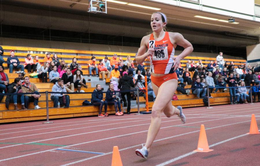 Illinois Colette Falsey (485) runs in the 1 Mile Run event at the Orange & Blue meet at the Armory on Saturday, Feb. 21. Illinois womens team won 1st place out of 5.