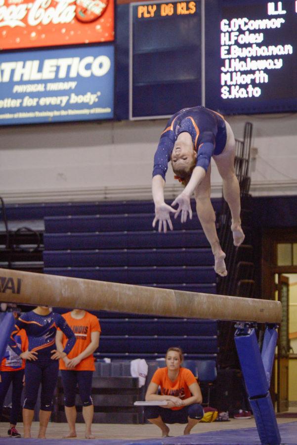 Illinois Mary Jane Horth performs a routine on the balance beam during the meet against Minnesota at Huff Hall on February 7. The Illini won 195.775-195.375.