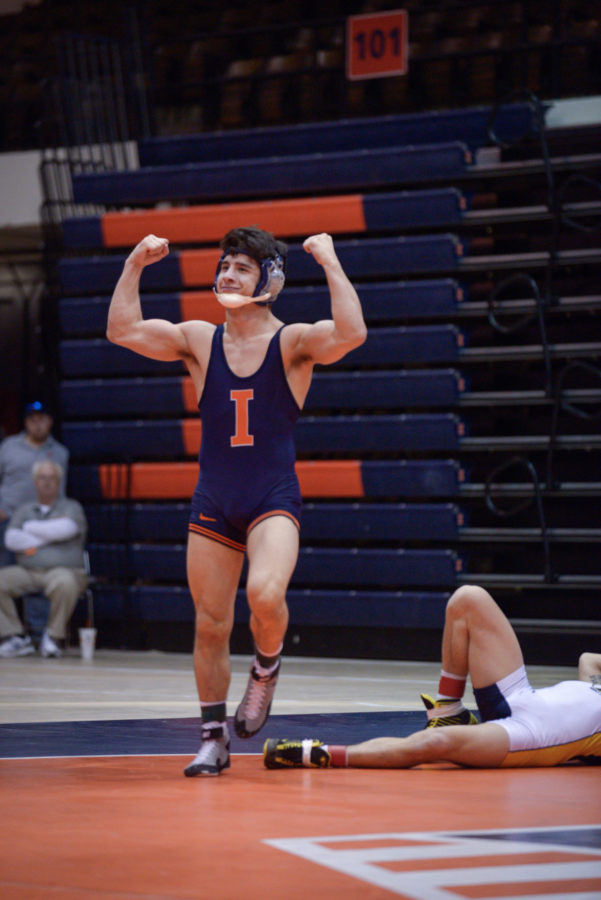 Illinois+Isaiah+Martinez+pops+off+after+his+victory+over+Kent+States+Ian+Miller+during+the+match+at+Huff+Hall+on+Sunday%2C+February+15.+The+Illini+won+38-0.