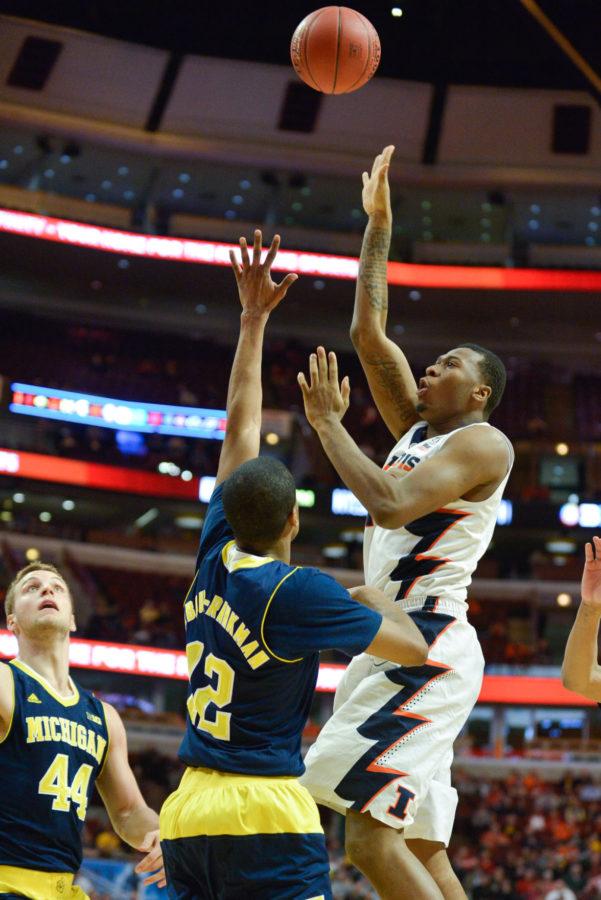 Illinois’ Leron Black (12) takes a shot during the game against Michigan at United Center in Chicago, Illinois during the Big Ten Tournament on Thursday, March 12, 2015. The Illini lost 73-55.