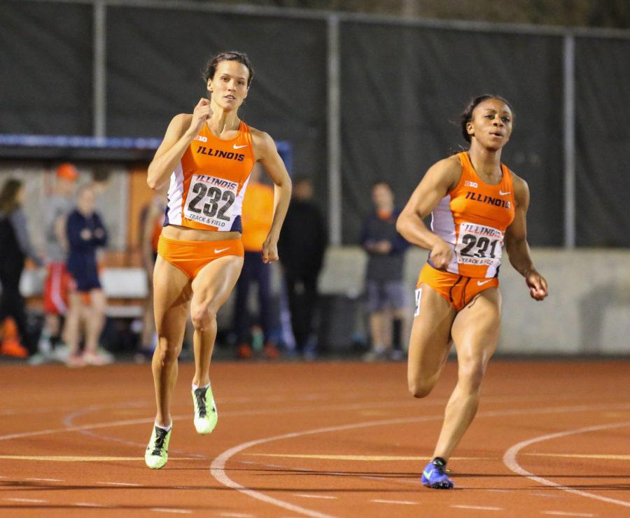 Illinois Amanda Duvendak (232) runs the 200 meter dash during the Illinois Twilight Invitational at the Track and Soccer Stadium on Saturday, April 18.