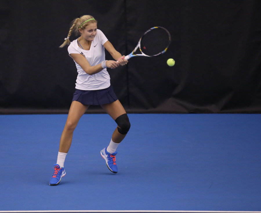 Illinois Julia Jamieson attempts to return the ball during the match against Indiana at Atkins Tennis Center, on Sunday, March, 1. The Illini won 6-1.