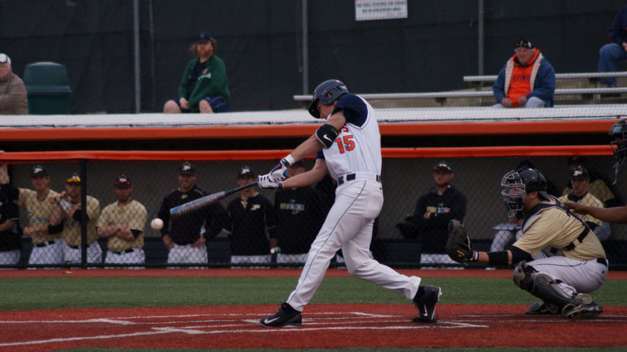 Illinois’ Ryne Roper swings during the team’s 2-1 win over Purdue at Illinois Field on Monday.