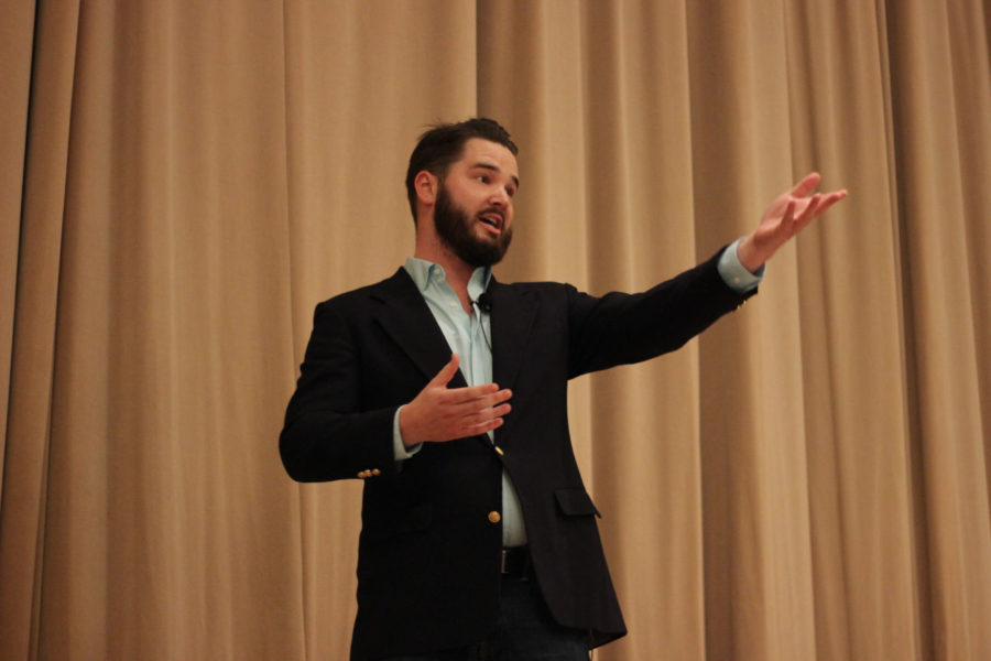 Nick Hyde, Illinois law student, gives a performance at Monday’s C-U Comedy Competition at Gregory Hall.